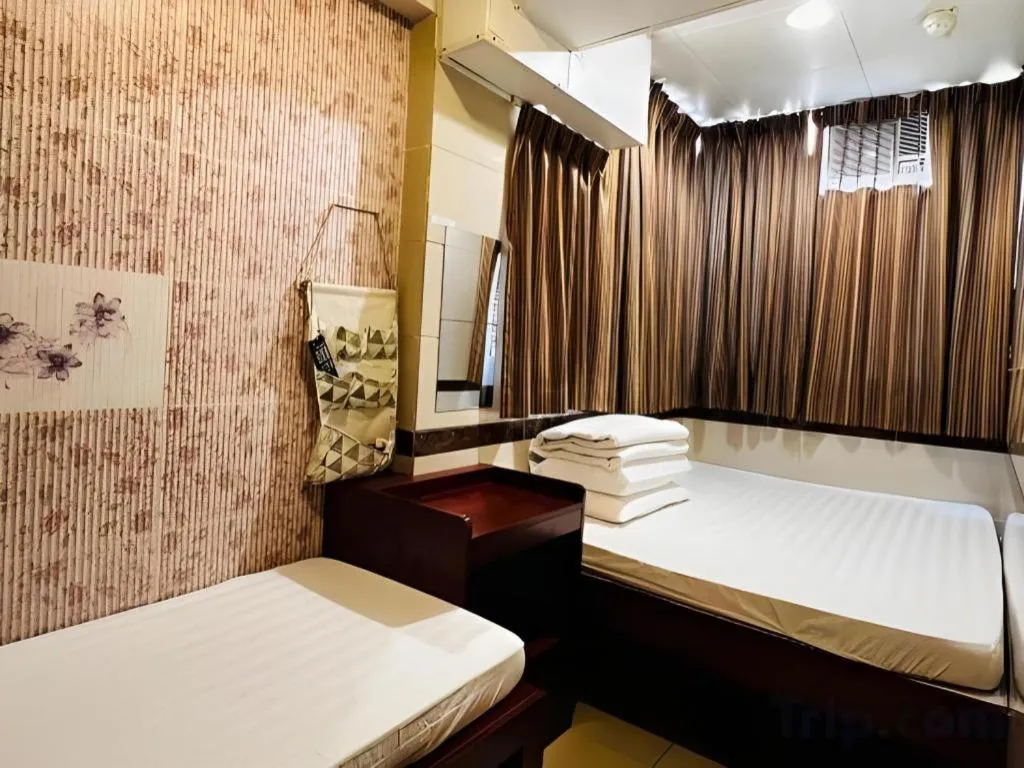 Bed in New Mong Kok Guest House