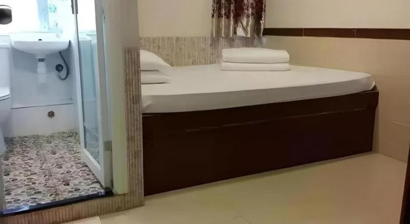 Bed in New Mong Kok Guest House