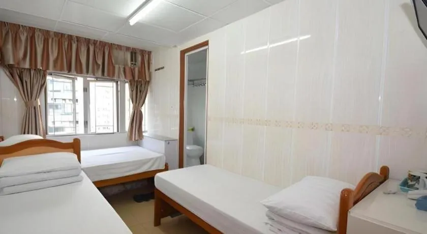 Bed in New Mong Kok Guest House