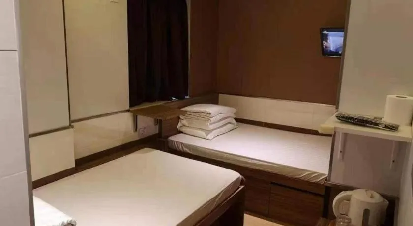 Bed in New Mong Kok Guest House