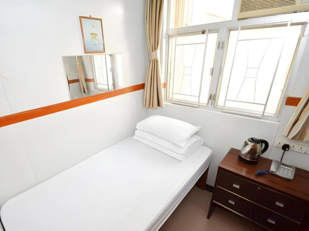 Bed in New Mong Kok Guest House