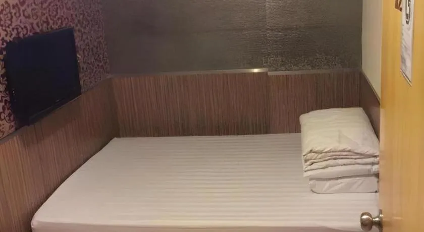 Bed in New Mong Kok Guest House