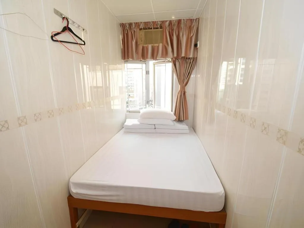 Bed in New Mong Kok Guest House