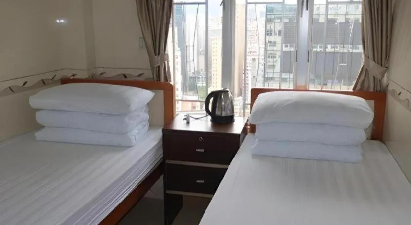 Bed in New Mong Kok Guest House
