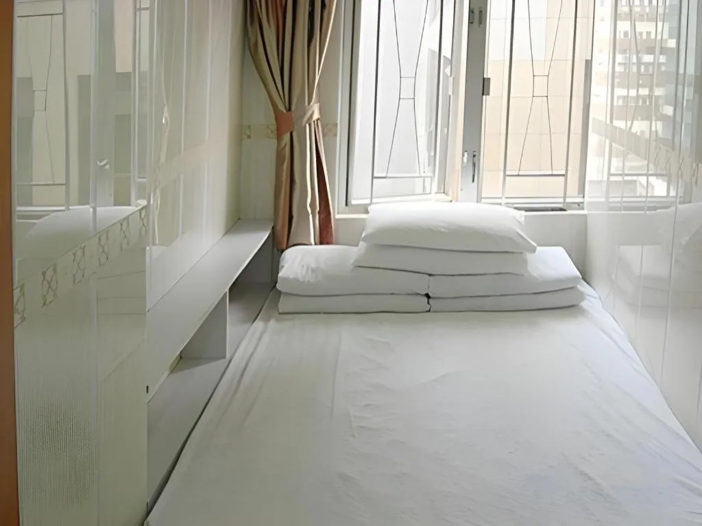 Bed in New Mong Kok Guest House