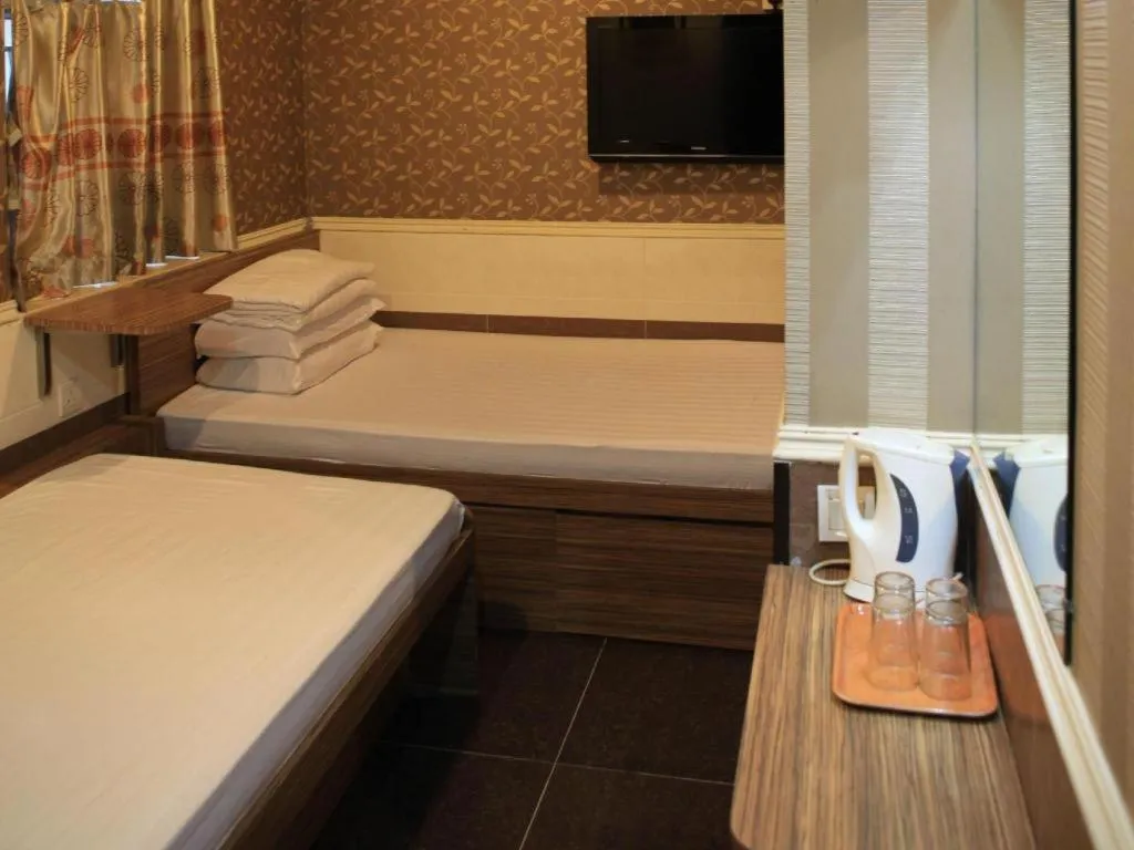 Bed in New Mong Kok Guest House