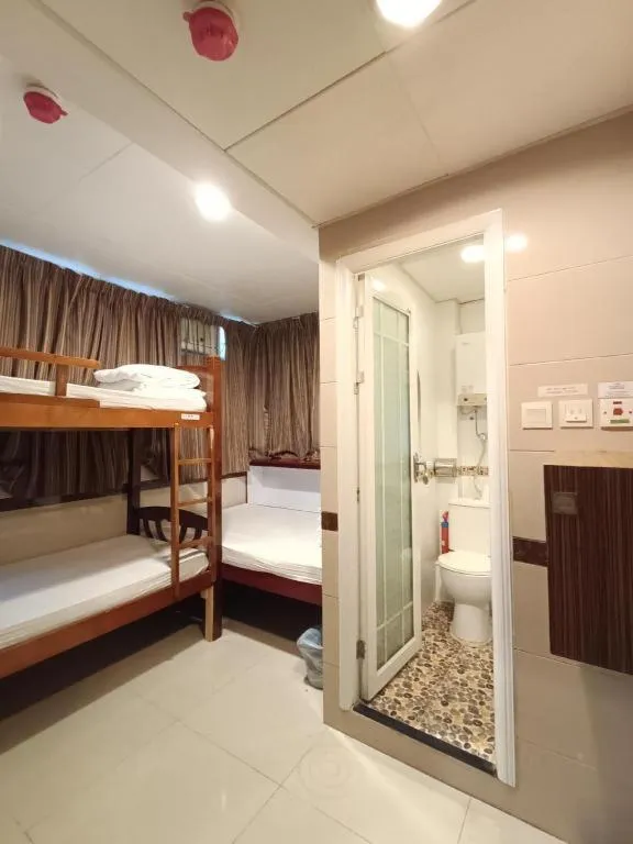 Bed in New Mong Kok Guest House