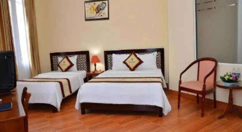 Bed in 7S Hotel Thu Bon Danang