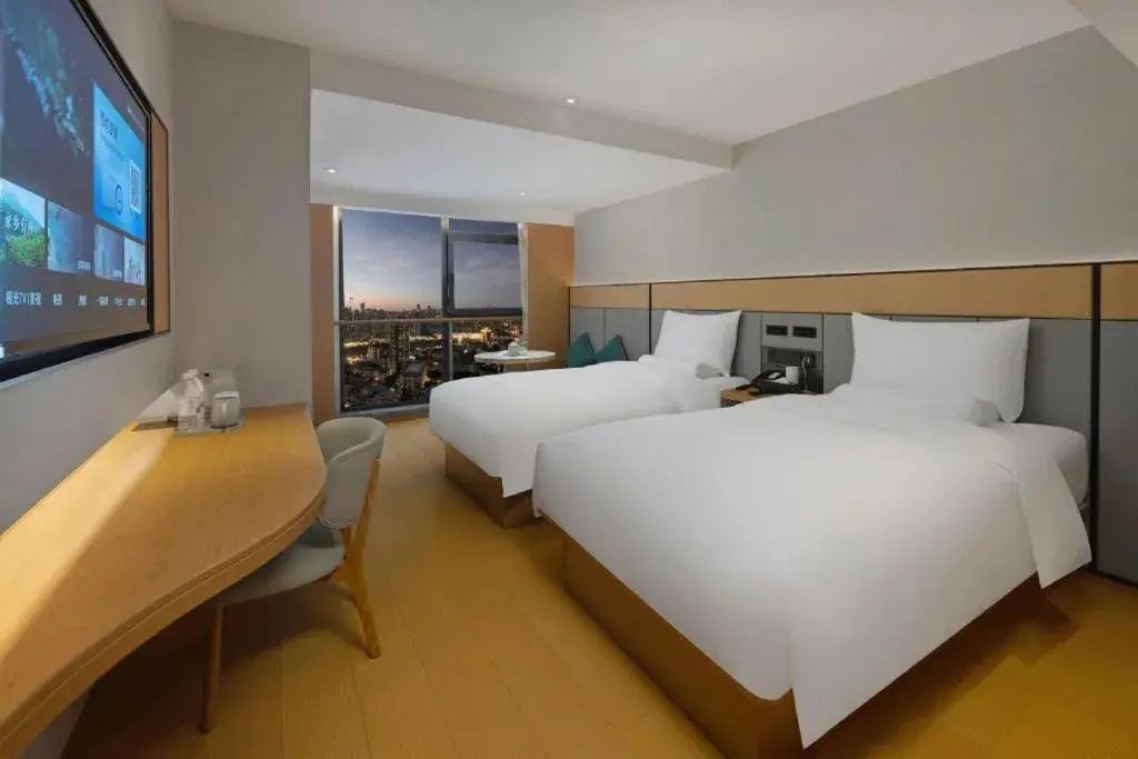 Bed in JI Hotel Chongqing Shangqing Temple Bed in JI Hotel Chongqing Shangqing Temple