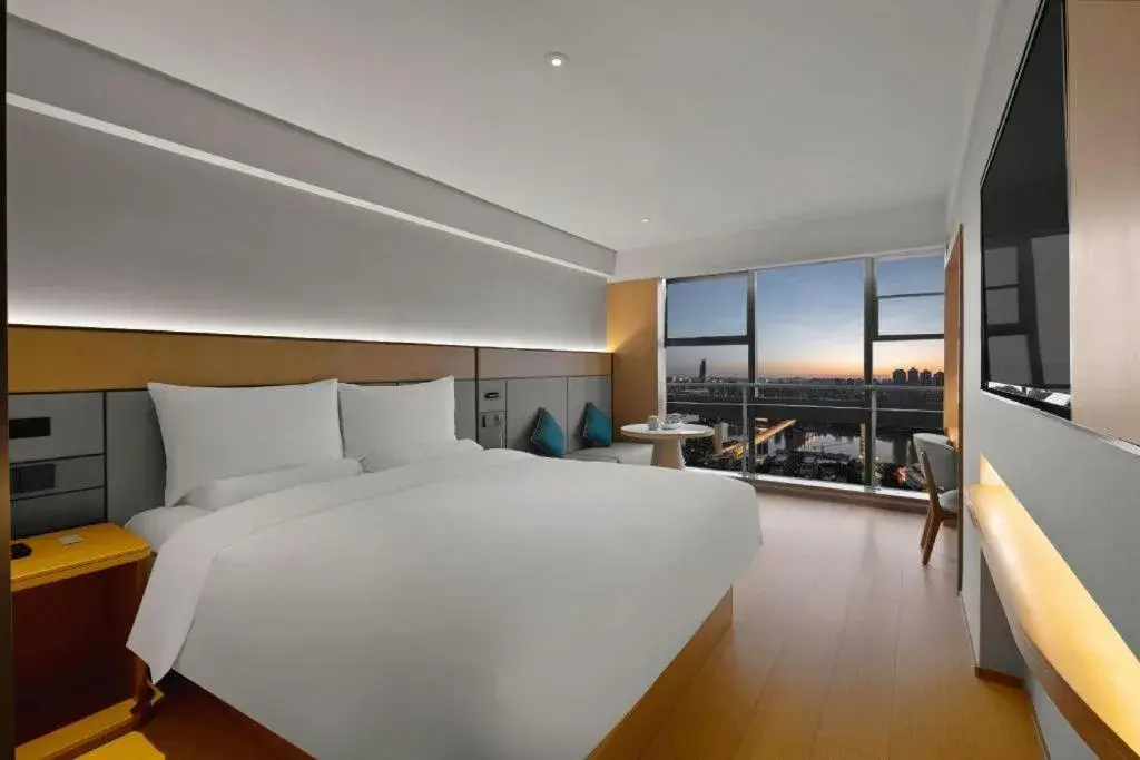 Bed in JI Hotel Chongqing Shangqing Temple Bed in JI Hotel Chongqing Shangqing Temple