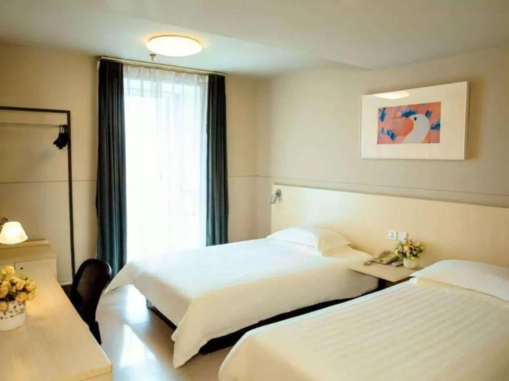 Bed in Jinjiang Inn Weihai Liugong Island Scenic Spot Shopping Market