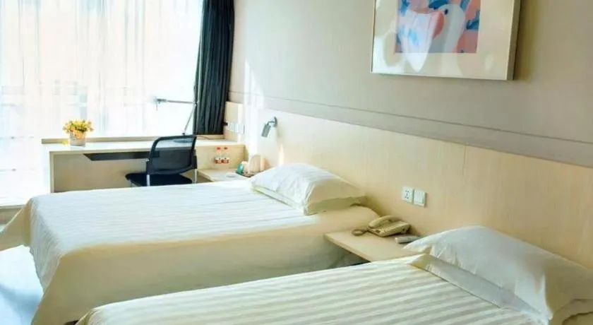 Bed in Jinjiang Inn Weihai Liugong Island Scenic Spot Shopping Market