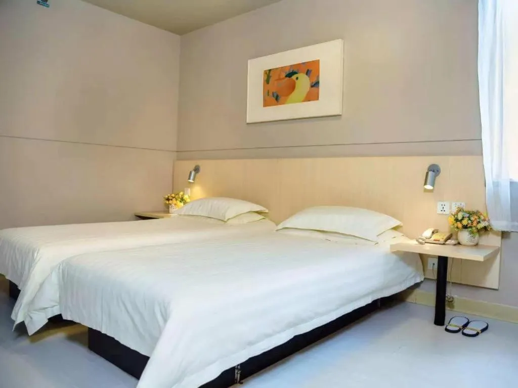 Bed in Jinjiang Inn Weihai Liugong Island Scenic Spot Shopping Market