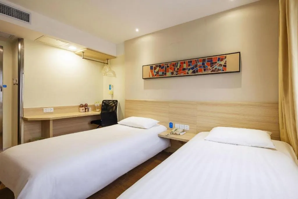 Bed in Hanting Hotel Hangzhou West Lake Longjing Road