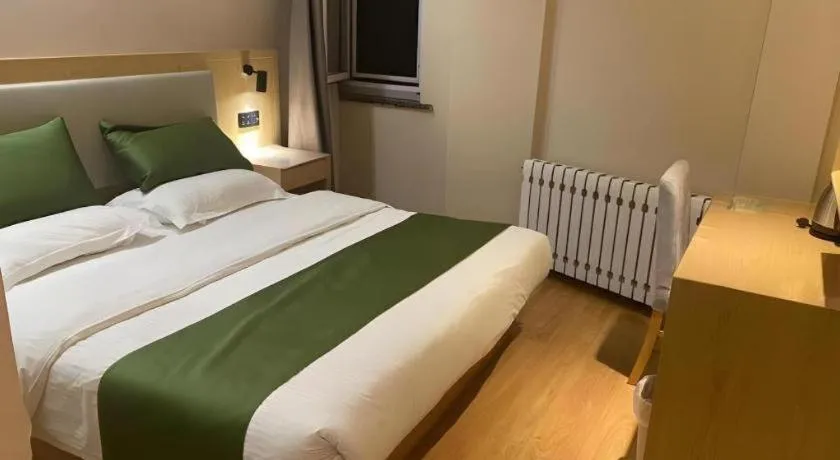 Bed in GreenTree Inn Liaoning Province Huludao City Xingcheng Shoushan Express Hotel