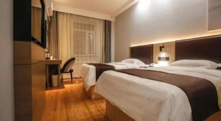 Bed in GreenTree Inn Liaoning Province Huludao City Xingcheng Shoushan Express Hotel