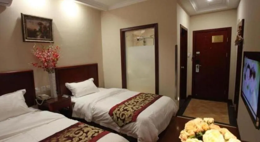 Bed in GreenTree Inn Liaoning Province Huludao City Xingcheng Shoushan Express Hotel