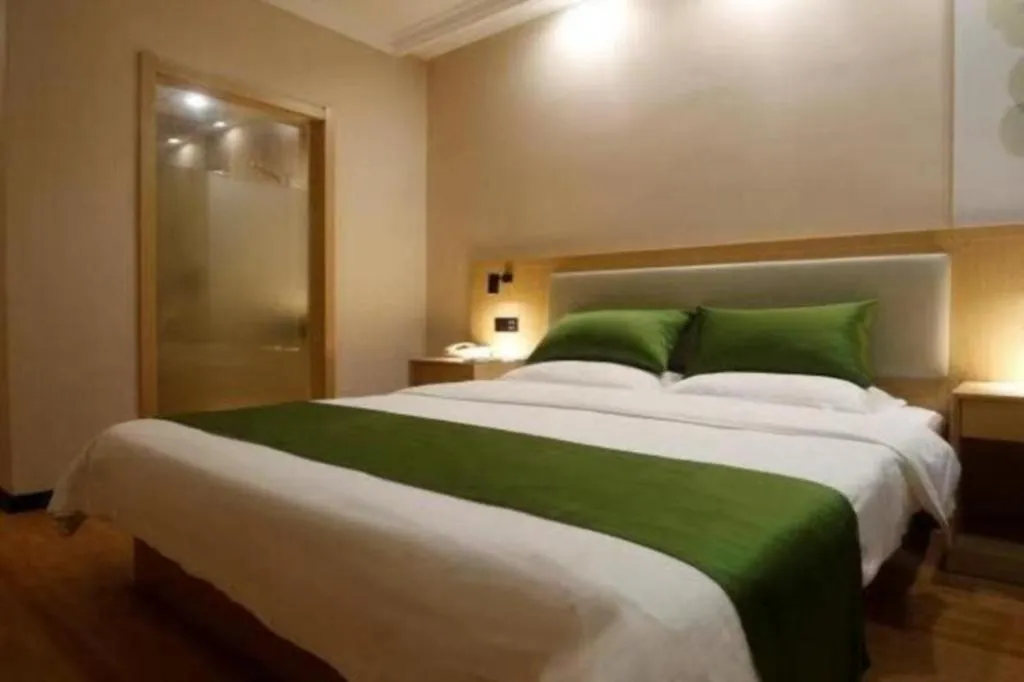 Bed in GreenTree Inn Liaoning Province Huludao City Xingcheng Shoushan Express Hotel