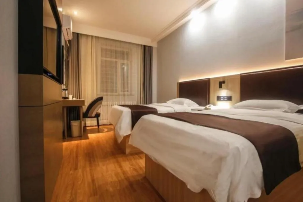 Bed in GreenTree Inn Liaoning Province Huludao City Xingcheng Shoushan Express Hotel
