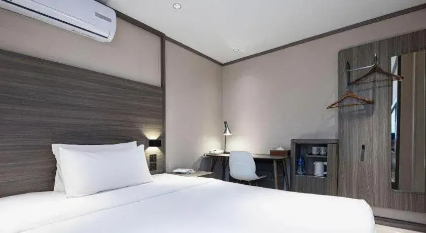 Bed in Hanting Hotel Changsha Xiangya Fu'er Ziyuan Road Bed in Hanting Hotel Changsha Xiangya Fu'er Ziyuan Road