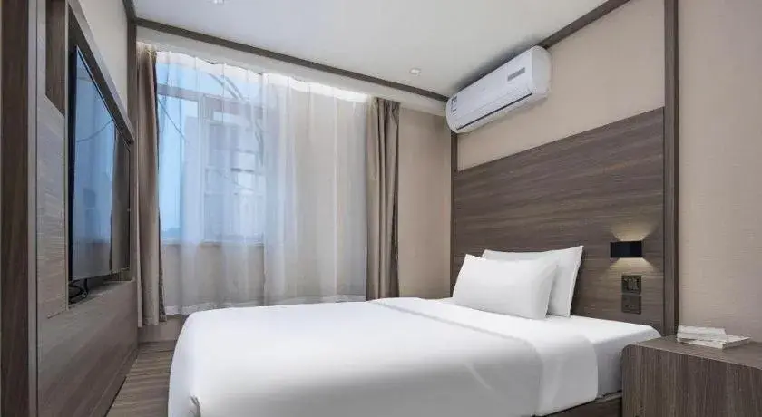 Bed in Hanting Hotel Changsha Xiangya Fu'er Ziyuan Road Bed in Hanting Hotel Changsha Xiangya Fu'er Ziyuan Road