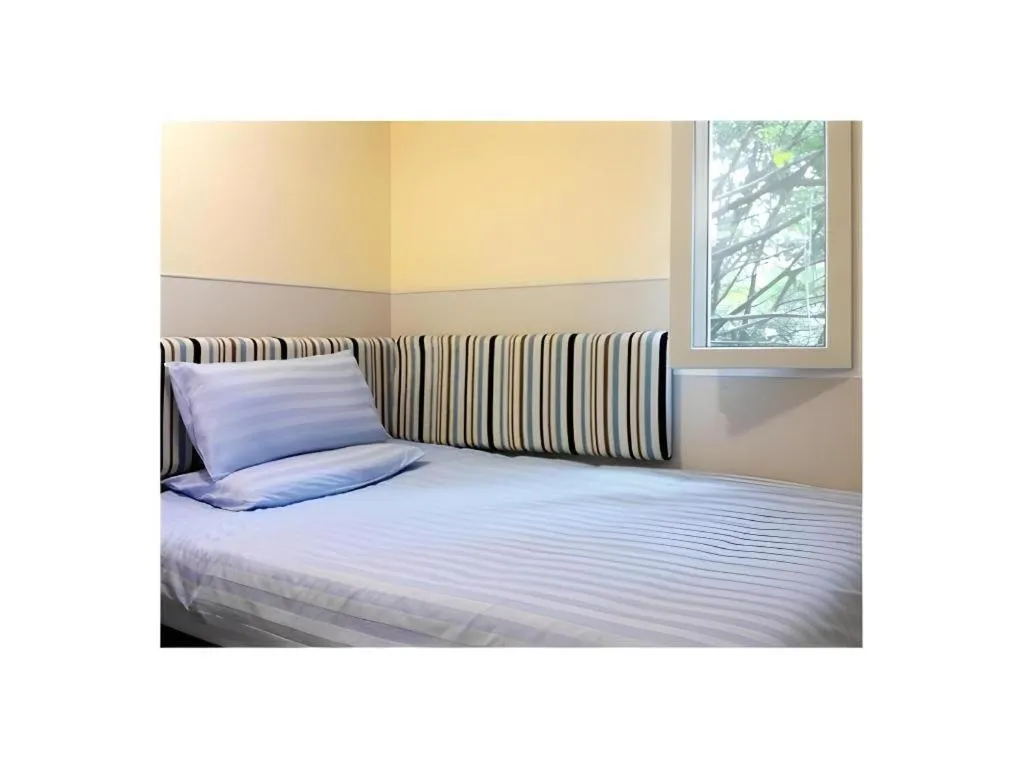 Bed in Hi Inn Guangzhou Gangding Metro Station