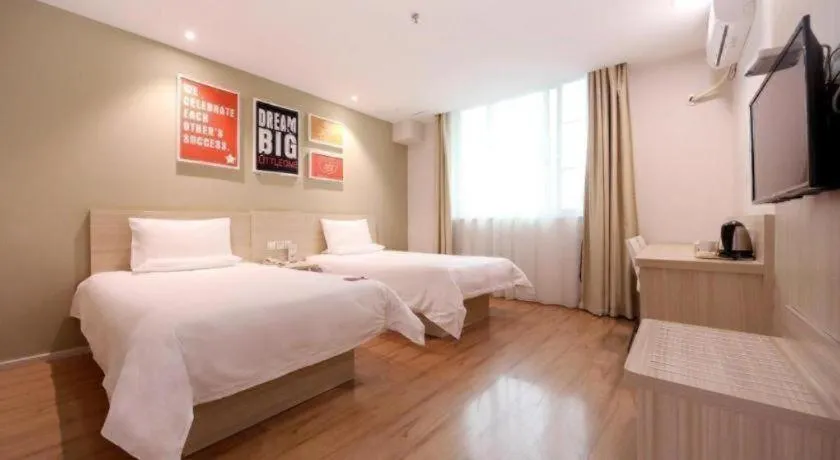 Bed in Hi Inn Guangzhou Gangding Metro Station