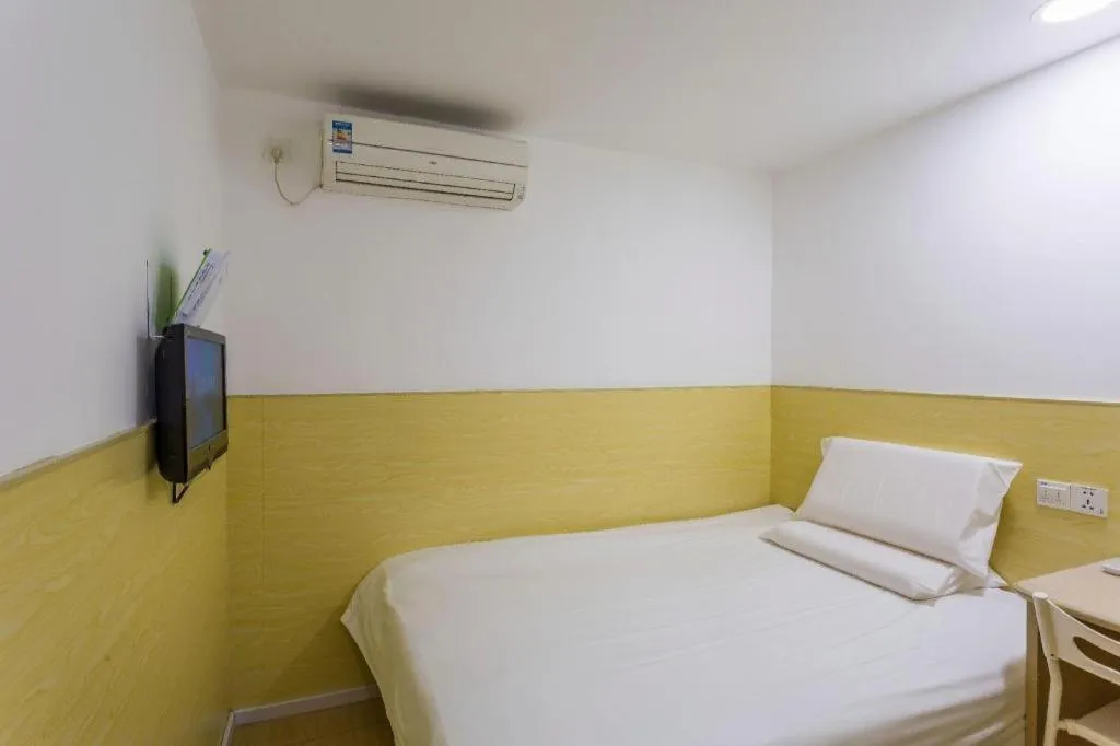 Bed in Hi Inn Guangzhou Gangding Metro Station