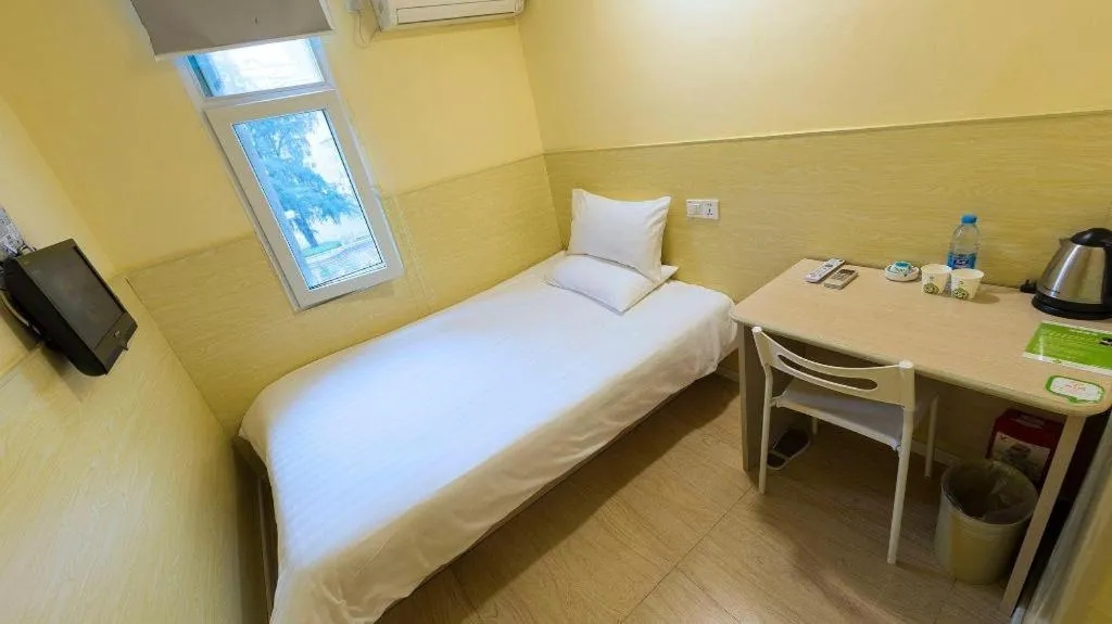 Bed in Hi Inn Guangzhou Gangding Metro Station