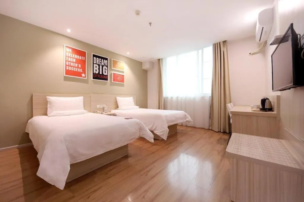 Bed in Hi Inn Guangzhou Gangding Metro Station