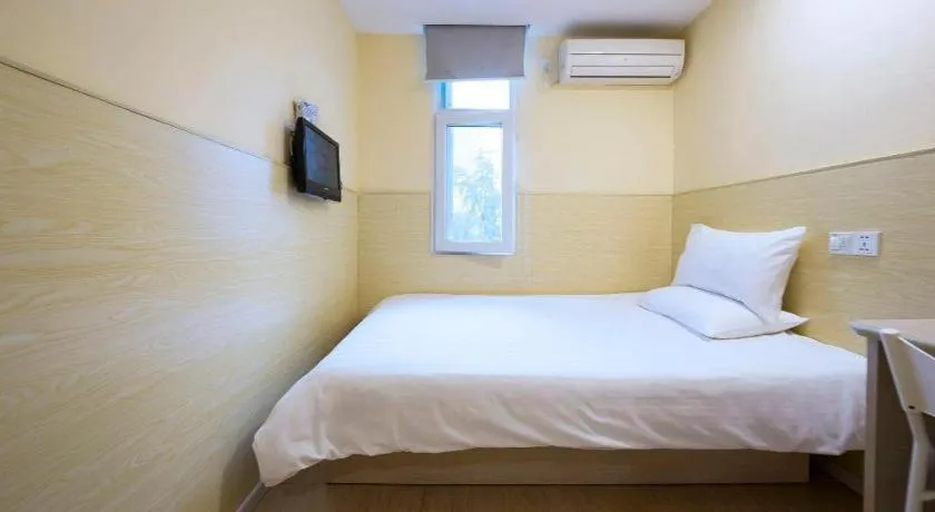 Bed in Hi Inn Guangzhou Gangding Metro Station