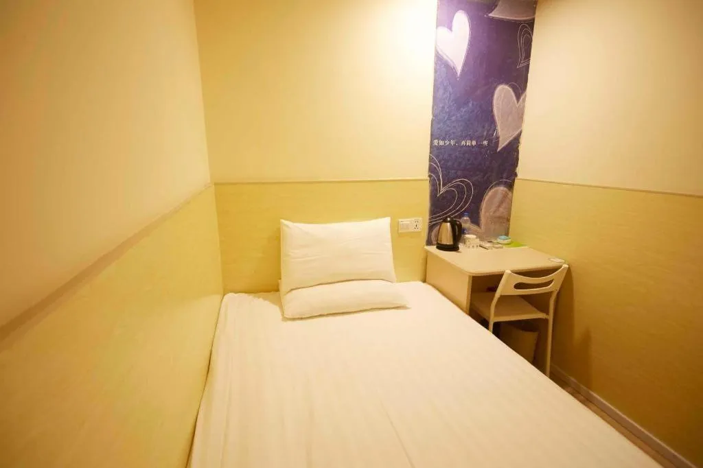 Bed in Hi Inn Guangzhou Gangding Metro Station