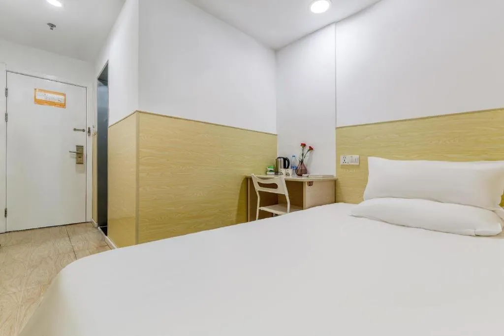 Bed in Hi Inn Guangzhou Gangding Metro Station