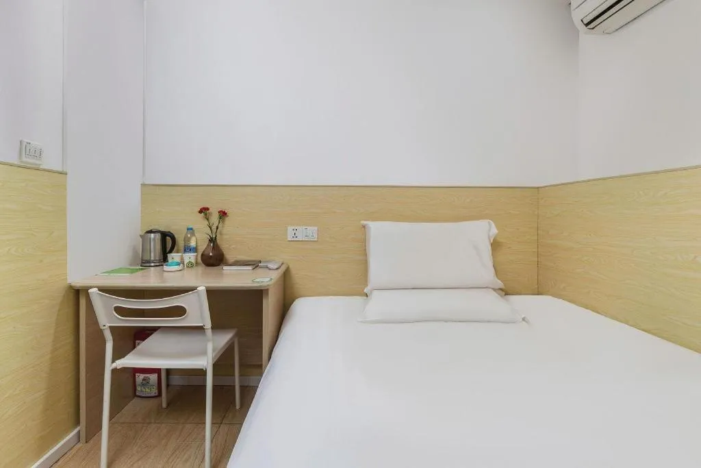 Bed in Hi Inn Guangzhou Gangding Metro Station