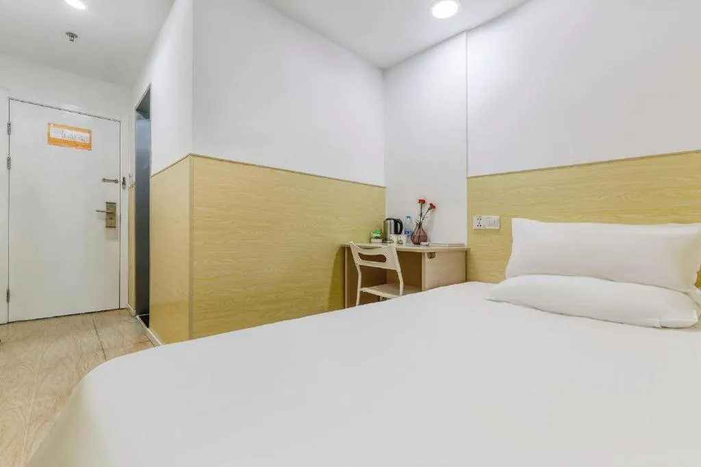 Bed in Hi Inn Guangzhou Gangding Metro Station