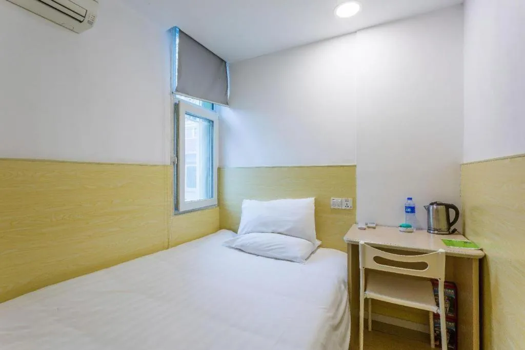 Bed in Hi Inn Guangzhou Gangding Metro Station