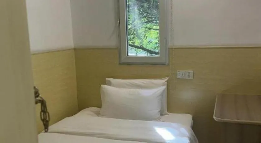 Bed in Hi Inn Guangzhou Gangding Metro Station