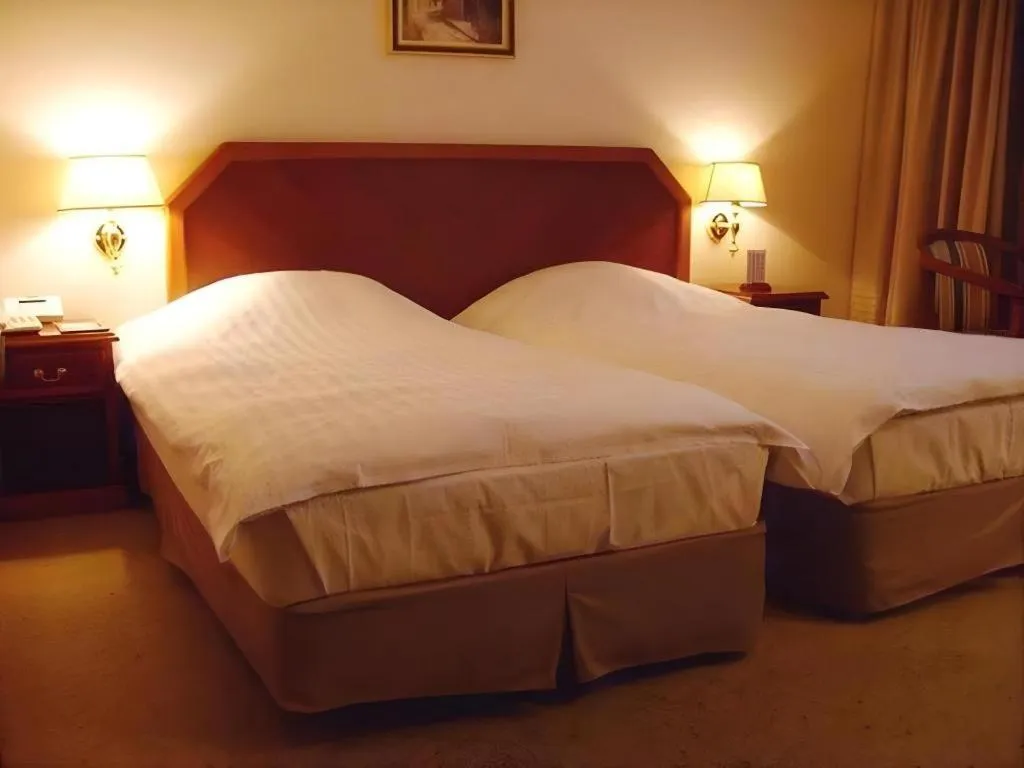 Bed in Onyang Hot Spring Hotel