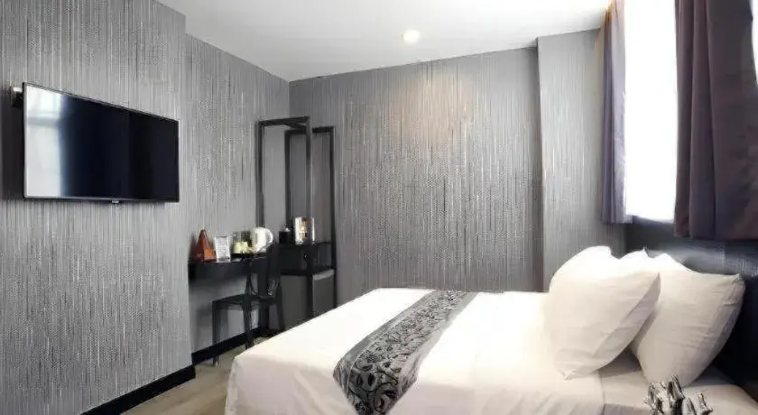 Bed in M1 North Point Hotel Bed in M1 North Point Hotel