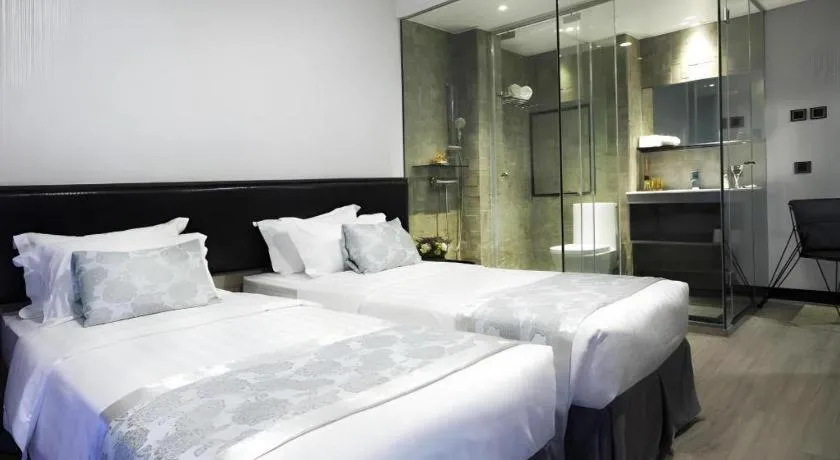 Bed in M1 North Point Hotel