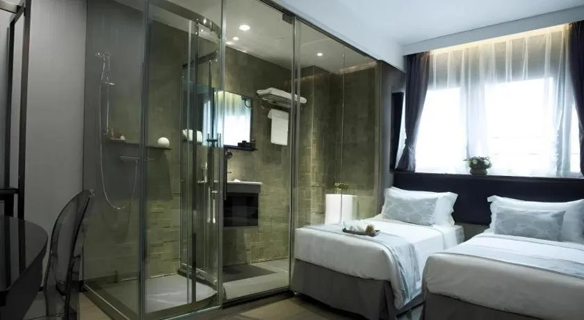 Bed in M1 North Point Hotel