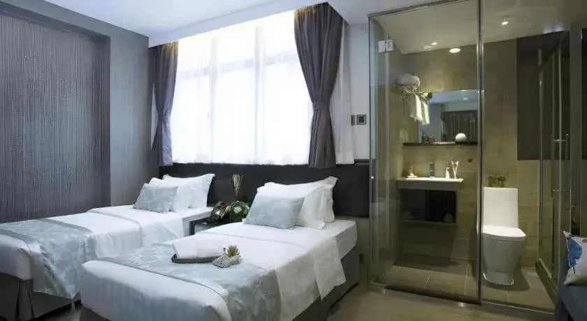 Bed in M1 North Point Hotel Bed in M1 North Point Hotel