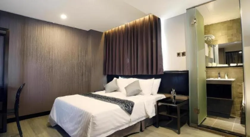 Bed in M1 North Point Hotel