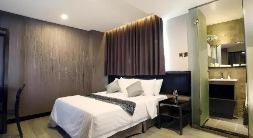 Bed in M1 North Point Hotel Bed in M1 North Point Hotel