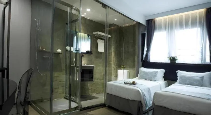 Bed in M1 North Point Hotel