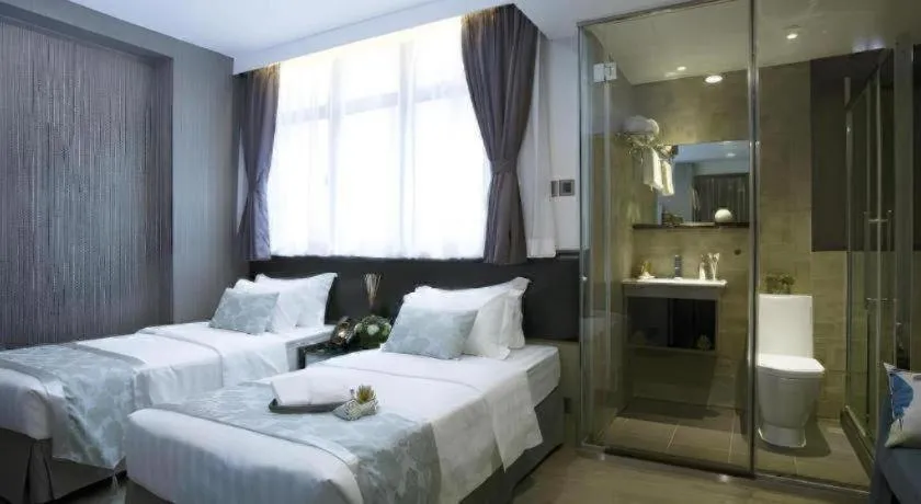 Bed in M1 North Point Hotel