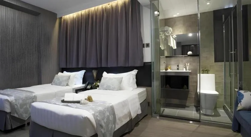 Bed in M1 North Point Hotel