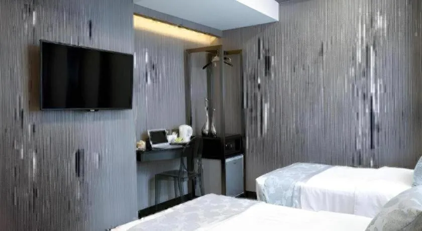 Bed in M1 North Point Hotel