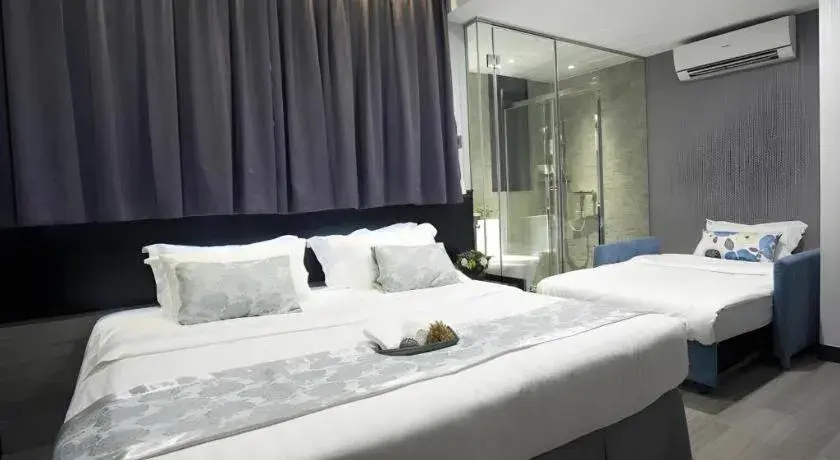 Bed in M1 North Point Hotel Bed in M1 North Point Hotel