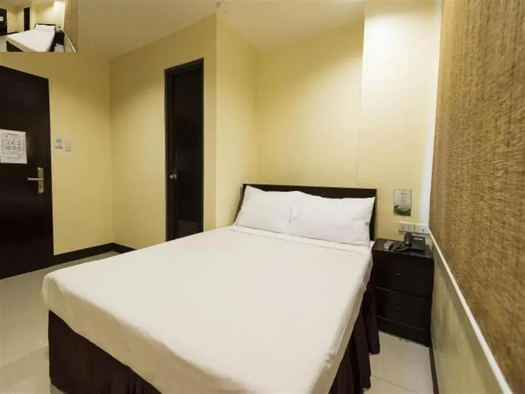 Bed in Winzelle Suites Bed in Winzelle Suites